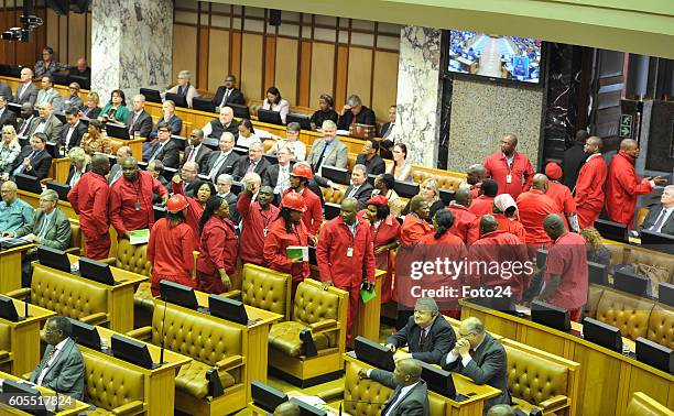 Economic Freedom Fighters members leave the national assembly during President Jacob Zuma Question and Answer session on September 13, 2016 in Cape...