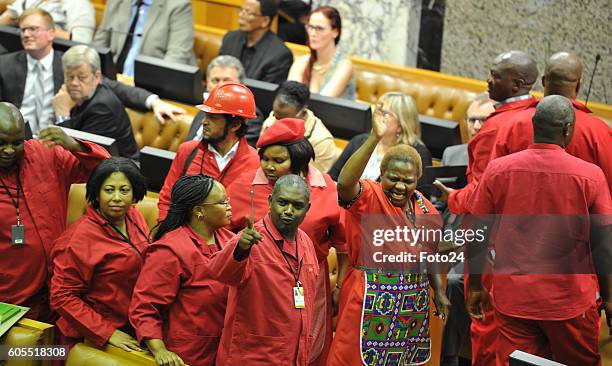 Economic Freedom Fighters members leave the national assembly during President Jacob Zuma Question and Answer session on September 13, 2016 in Cape...