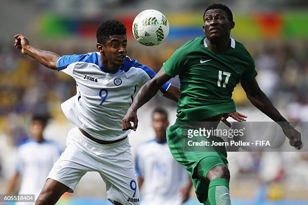 Antony Lozano of Honduras and Usman Muhammed of Nigeria compete for the bal during the Men's Olympic Football Bronze Medal match between Honduras and...