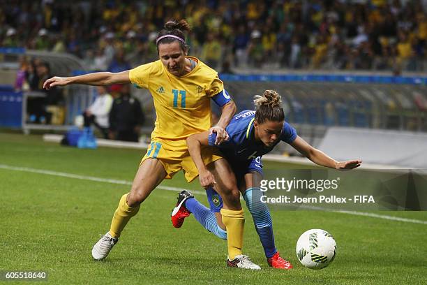Tamires of Brasil and Lisa de Vanna of Australia compete for the ball during the Women's Quarter Final match between Brasil and Australia on Day 7 of...