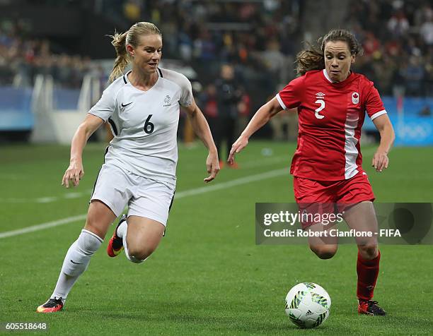 Amandine Henry of France is chased by Allysha Chapman of Canad during the Women's Football Quarter Final match between Canada and France on Day 7 of...