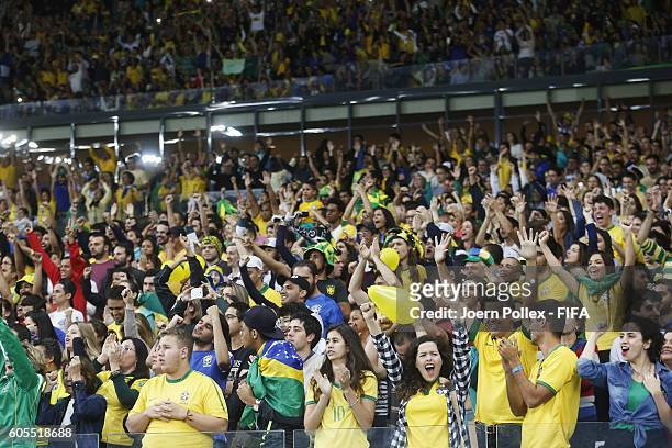 Supporter of Brasil celebrate during the Women's Quarter Final match between Brasil and Australia on Day 7 of the Rio2016 Olympic Games at Mineirao...