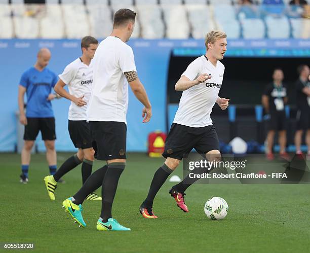 Julian Brandt of Germany warms up for the Men's Football Semi Final between Nigeria and Germany on Day 12 of the Rio 2016 Olympic Games at Arena...