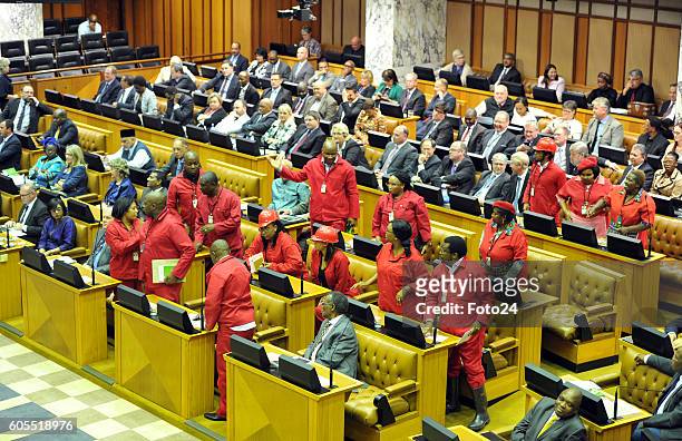 Economic Freedom Fighters members leave the national assembly during President Jacob Zuma Question and Answer session on September 13, 2016 in Cape...