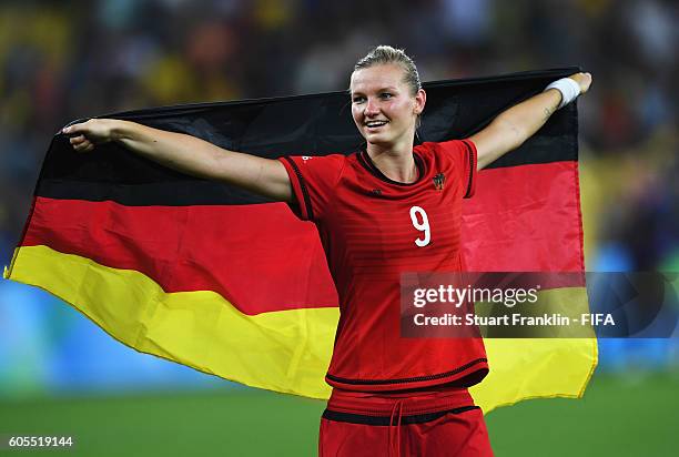 Alexandra Popp of Germany celebrates after winning the Olympic Women's Football final between Sweden and Germany at Maracana Stadium on August 19,...