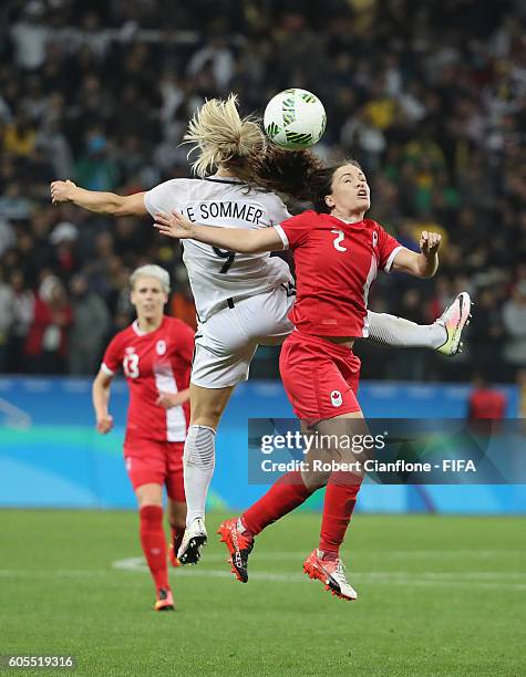 Allysha Chapman of Canada and Eugenie le Sommer of France compete for the ball during the Women's Football Quarter Final match between Canada and...