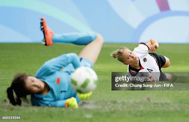 Leonie Maier of Germany heads for ball during the Women's Football Quarter Final match between China and Germany on Day 7 of the Rio 2016 Olympic...