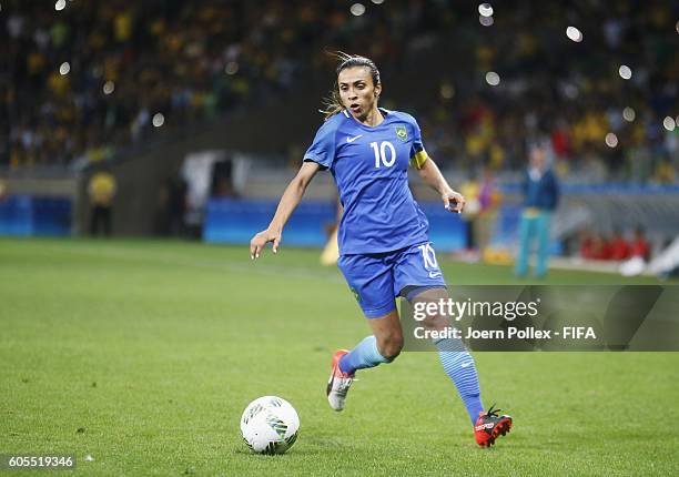Marta of Brasil controls the ball during the Women's Quarter Final match between Brasil and Australia on Day 7 of the Rio2016 Olympic Games at...