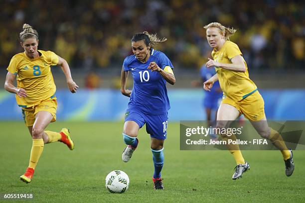 Marta of Brasil controls the ball during the Women's Quarter Final match between Brasil and Australia on Day 7 of the Rio2016 Olympic Games at...