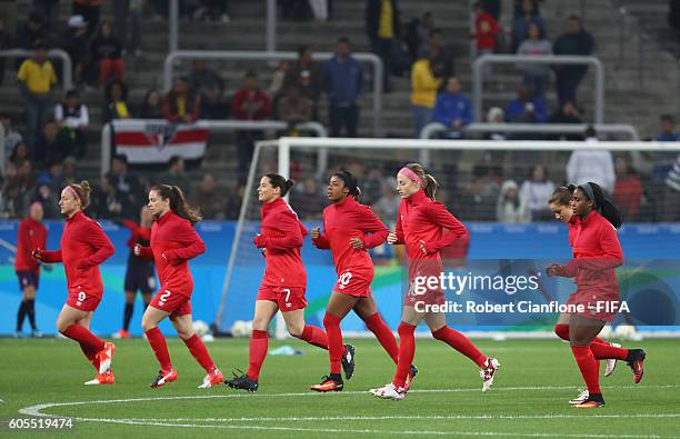 Canada warm up prior to the Women's Football Quarter Final match between Canada and France on Day 7 of the Rio 2016 Olympic Games at Arena...