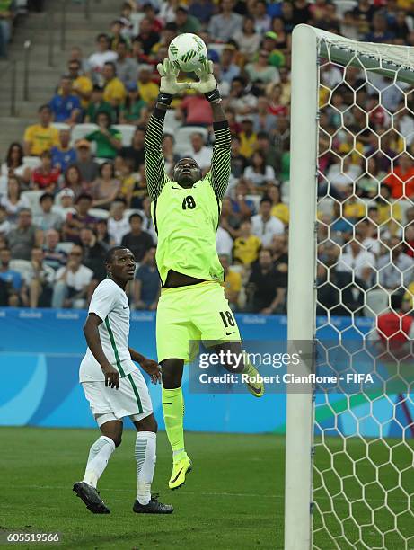 Nigerian goalkeeper Emmanuel Daniel takes the ball during the Men's Football Semi Final between Nigeria and Germany on Day 12 of the Rio 2016 Olympic...