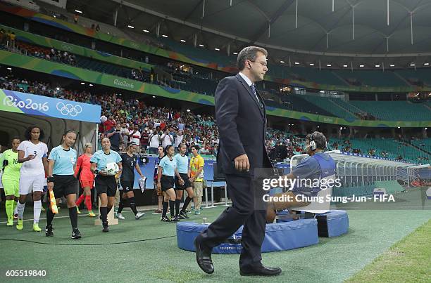 Rafael Tinoco, a general coordinator of FIFA works on the pitch before the Women's Football match between New Zealand and France on Day 4 of the Rio...