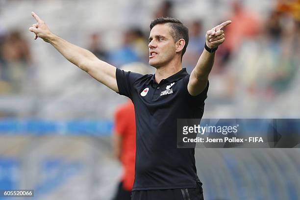 Head coach John Herdman of Canada gestures during the Women's Semi Final match between Canada and Germany on Day 11 of the Rio2016 Olympic Games at...