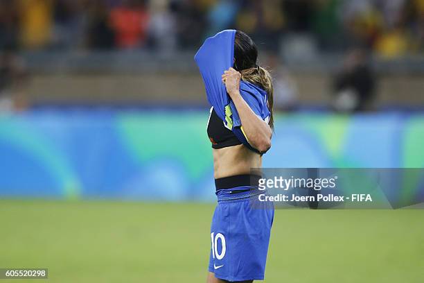 Marta of Brasil reacts after missing a penalty during the Women's Quarter Final match between Brasil and Australia on Day 7 of the Rio2016 Olympic...