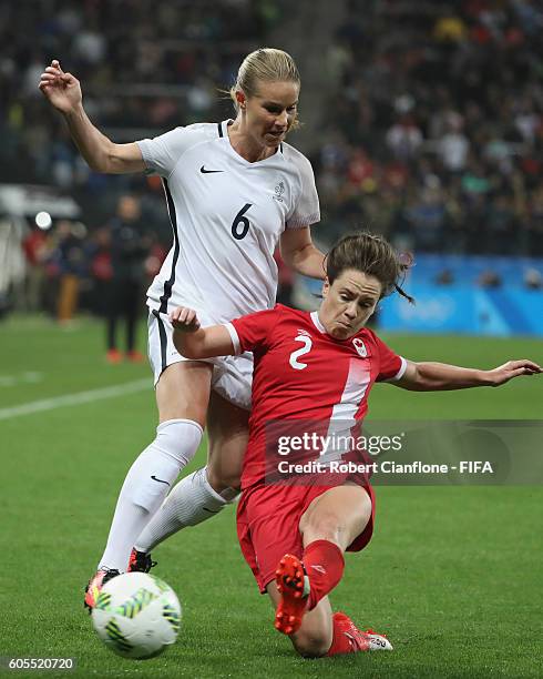 Amandine Henry of France is challenged by Allysha Chapman of Canad during the Women's Football Quarter Final match between Canada and France on Day 7...