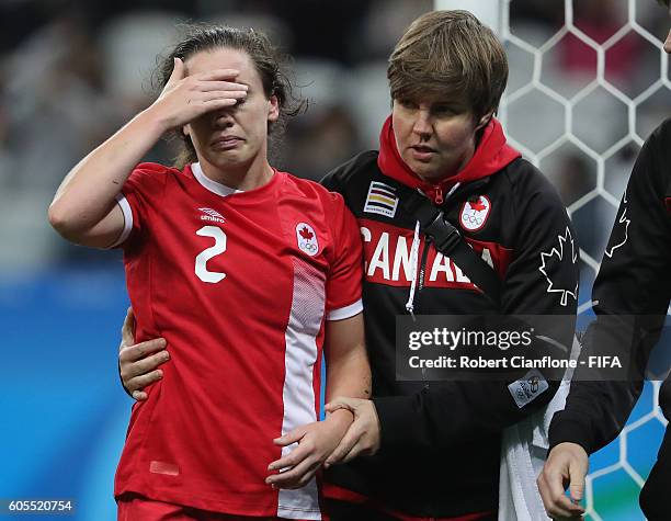 Allysha Chapman of Canada leaves the ground with an injury during the Women's Football Quarter Final match between Canada and France on Day 7 of the...