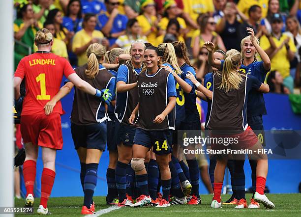 Hedvig Lindahl of Sweden celebrates saving a penalty during the Olympic Womens Semi Final Football match between Brazil and Sweden at Maracana...