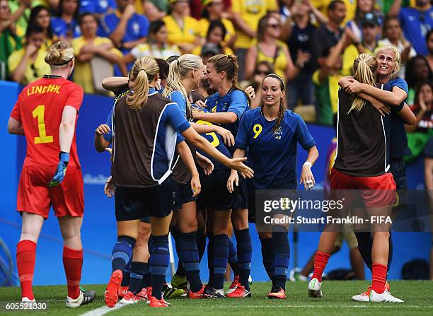 Hedvig Lindahl of Sweden celebrates saving a penalty during the Olympic Womens Semi Final Football match between Brazil and Sweden at Maracana...