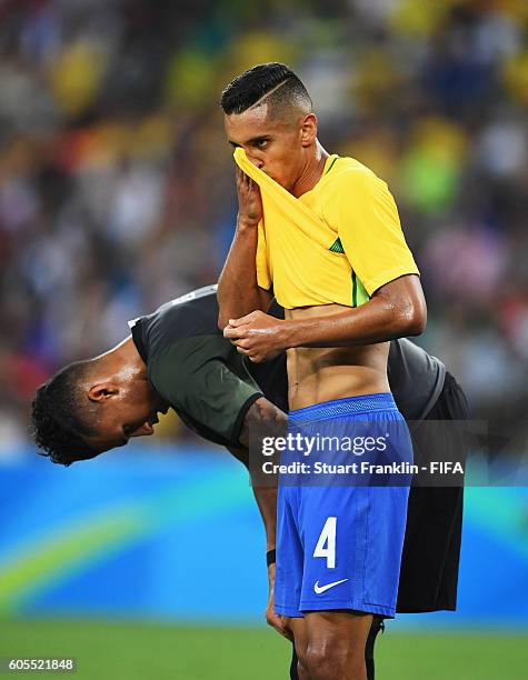 Marquinhos of Brazil ponders during the Olympic Men's Final Football match between Brazil and Germany at Maracana Stadium on August 20, 2016 in Rio...