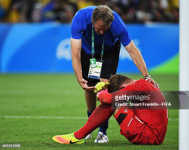 Timo Horn of Germanylooks dejected after the penalty shoot out at the Olympic Men's Final Football match between Brazil and Germany at Maracana...
