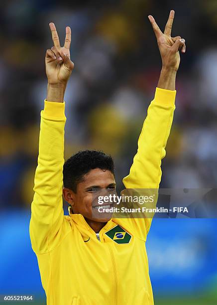 Douglas Santos of Brazil celebrates during the Olympic Men's Final Football match between Brazil and Germany at Maracana Stadium on August 20, 2016...