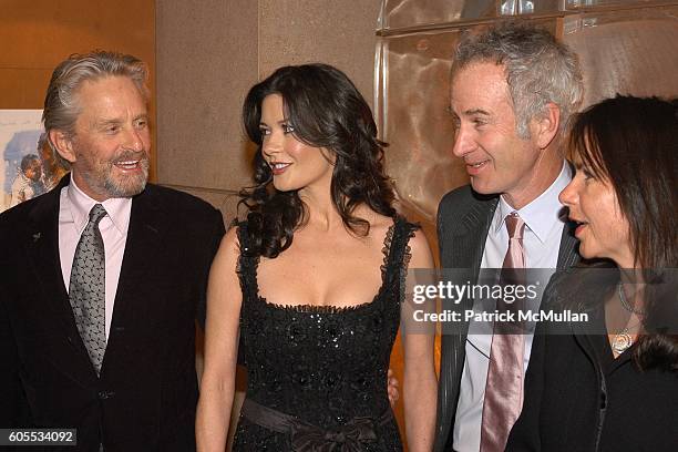 Michael Douglas, Catherine Zeta-Jones, John McEnroe and Patty Smyth attend A Tribute To Nelson Mandela Hosted by CARTIER at Rockefeller Plaza on...