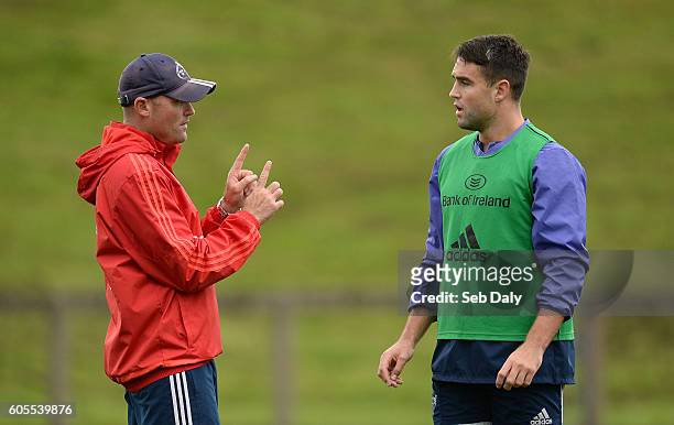 Limerick , Ireland - 14 September 2016; Conor Murray, right, of Munster and Munster defence coach Jacques Nienaber during squad training at the...