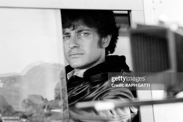 French actor Francis Huster poses on October 21, 1978 in Nice on the set of the film "Les Égouts du paradis" directed by José Giovanni, based on a...