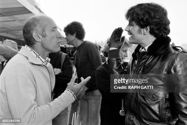 French actor Francis Huster and director José Giovanni chat on October 21, 1978 in Nice on the set of the film "Les Égouts du paradis" , based on a...