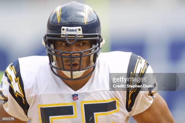 Linebacker Junior Seau of the San Diego Chargers studies the Washington Redskins offensive formation as he awaits the snap in their game at Qualcomm...