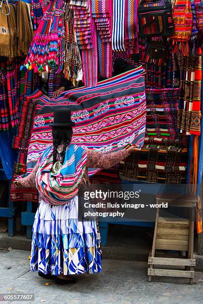 cholita buying aguayos - aguayos stock pictures, royalty-free photos & images