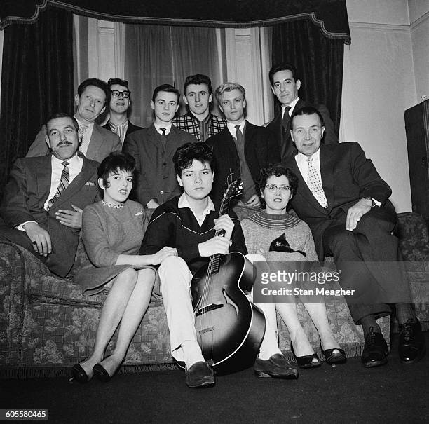 British pop singer Cliff Richard and his backing group The Shadows, 4th February 1959. Clockwise from rear left, Joe Lee , Hank Marvin, Tony Meehan,...