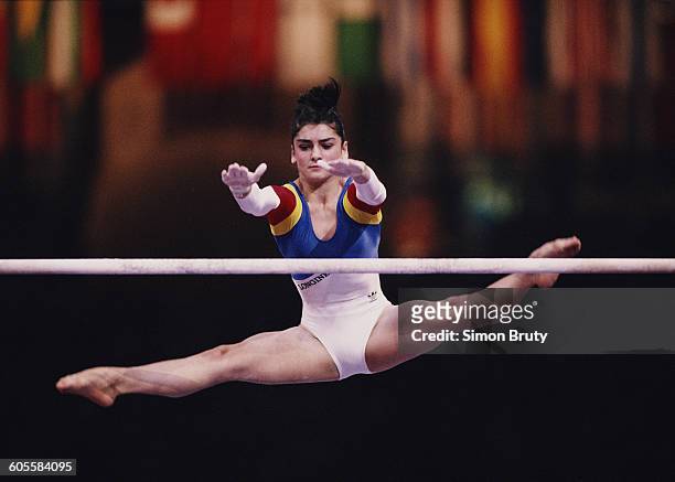 Marela Pasca of Romania performing on the uneven bars event on 1 October 1992 during the World Artistic Gymnastics Championships at the Palais...