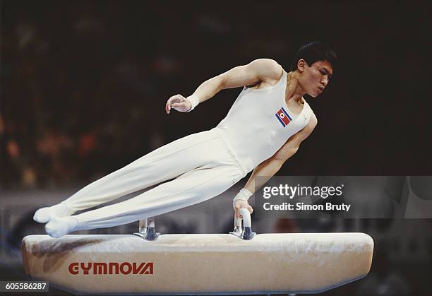 Pae Gil-Su of North Korea performing on the Pommel Horse on 1 October 1992 during the World Artistic Gymnastics Championships at the Palais...