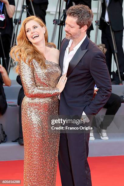 Amy Adams and Darren Le Gallo attend the premiere of 'Nocturnal Animals' during the 73rd Venice Film Festival at Sala Grande on September 2, 2016 in...