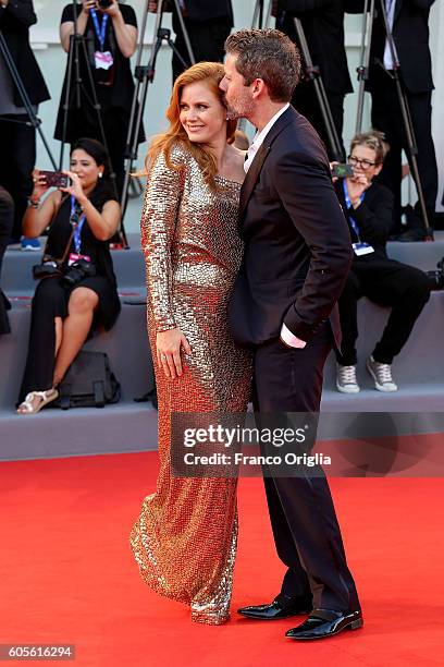 Amy Adams and Darren Le Gallo attend the premiere of 'Nocturnal Animals' during the 73rd Venice Film Festival at Sala Grande on September 2, 2016 in...