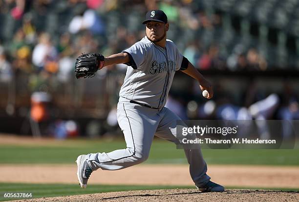 Vidal Nuno of the Seattle Mariners pitches against the Oakland Athletics in the bottom of the ninth inning at Oakland-Alameda County Coliseum on...