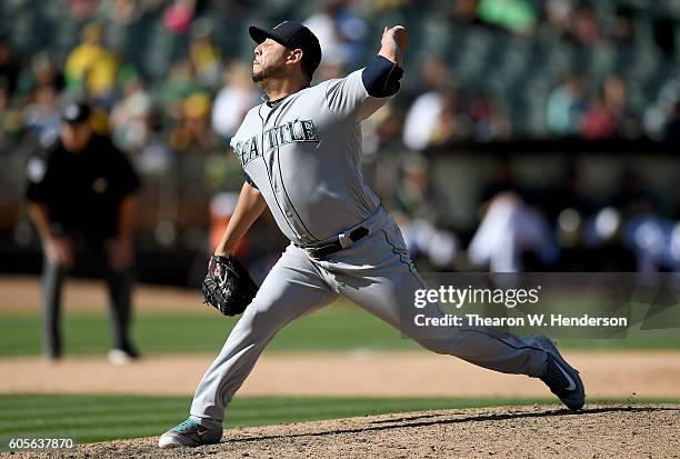 Vidal Nuno of the Seattle Mariners pitches against the Oakland Athletics in the bottom of the ninth inning at Oakland-Alameda County Coliseum on...