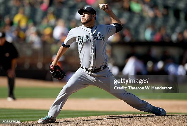 Vidal Nuno of the Seattle Mariners pitches against the Oakland Athletics in the bottom of the ninth inning at Oakland-Alameda County Coliseum on...