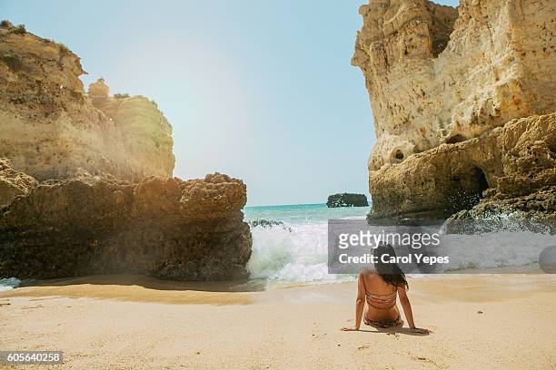 sitting on a beach,dona ana,lagos - portugal coast stock pictures, royalty-free photos & images