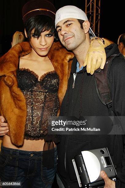 Omahyra Mota and Jeremy Kost attend Baby Phat Backstage at The Tent Bryant Park NYC USA on February 3, 2006.