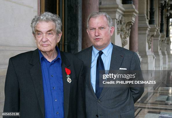Swiss theater director Benno Besson poses with Opera director Hugues ...