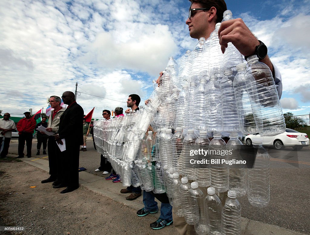 Protesters Demonstrate Against Donald Trump's Visit To Flint Michigan