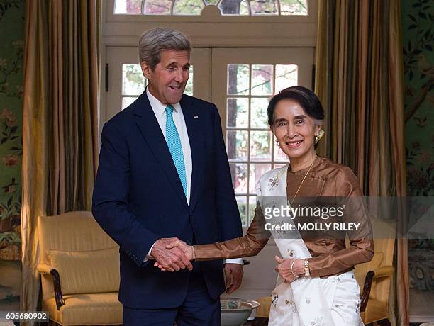 Secretary of State John Kerry meets with State Counsellor Aung San Suu Kyi of Burma for a working lunch at the Blair House September 14, 2016 in...
