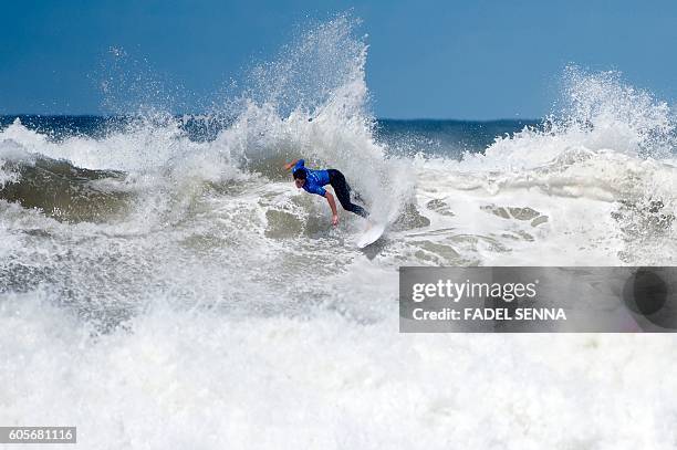 Surfer competes in the water in the men's qualifying series at the Quiksilver Pro Casablanca surf competition on September 14, 2016 in Casablanca. /...