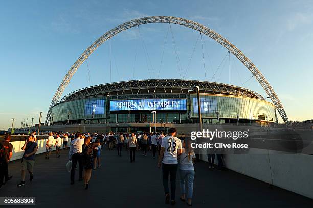 Fans arrive at the stadium prior to the UEFA Champions League match between Tottenham Hotspur FC and AS Monaco FC at Wembley Stadium on September 14,...