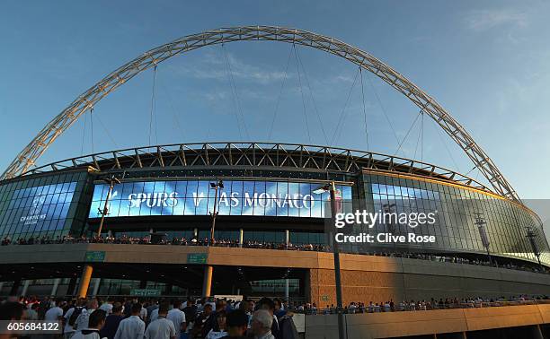 Tottenham Hotspur fans arrive at the stadium prior to the UEFA Champions League match between Tottenham Hotspur FC and AS Monaco FC at Wembley...