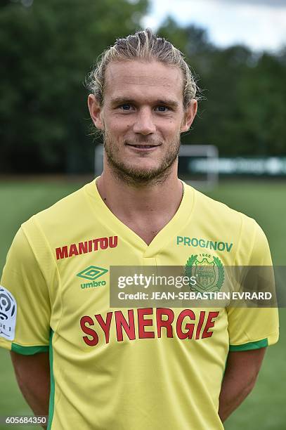 Nantes' Belgian midfielder Guillaume Gillet poses for the team's official picture at "La Joneliere", the club's headquarters in La...