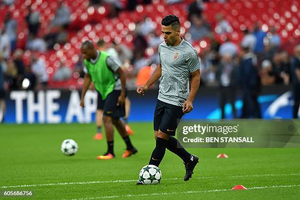 Monaco's Colombian forward Radamel Falcao warms up before the UEFA Champions League group E football match between Tottenham Hotspur and Monaco at...