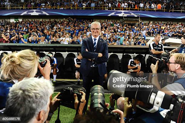 Photographers photograph manager Claudio Ranieri of Leicester City ahead of the Champions League tie between Club Brugge and Leicester City at Jan...